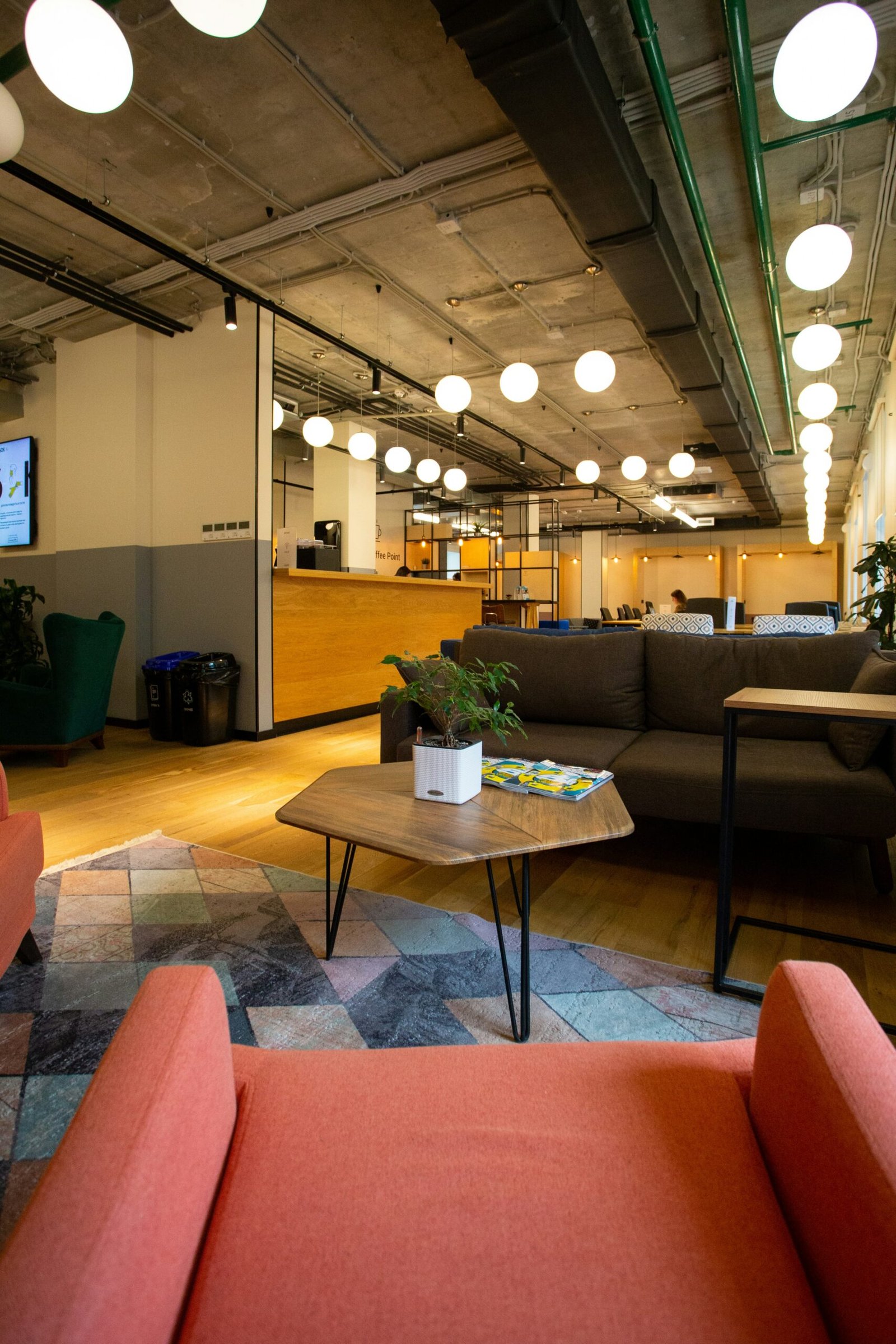 Creative co-working office space with seating area and collaborative environment